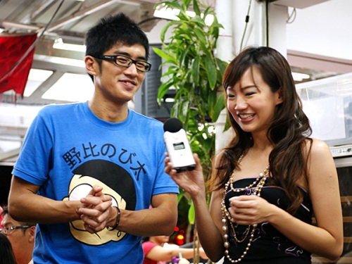 Y.E.S. 93.3FM DJs Xie Jiafa & Lin Peifen.